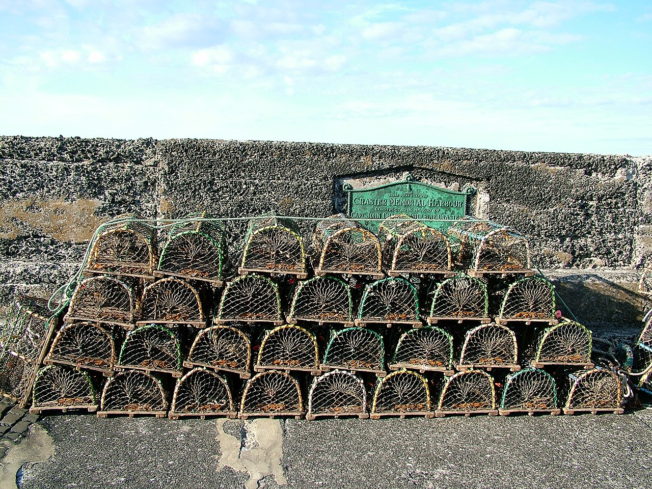 1280px-Lobster_pots_at_Craster_harbour_-_2005-06-25.jpg